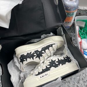 AMIRI stars court low black & white